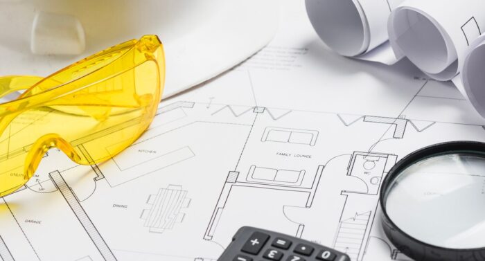 supplies-glasses-with-blueprints_23-2147710896