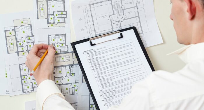 top-view-architect-working-house-project_23-2148346290